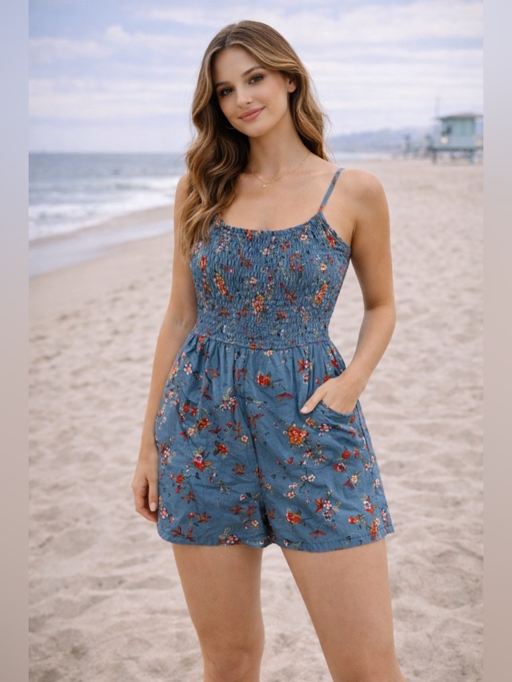 floral romper in a gorgeous dusty blue with vibrant floral print 🌸